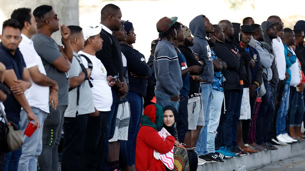 Photo of people waiting for asylum