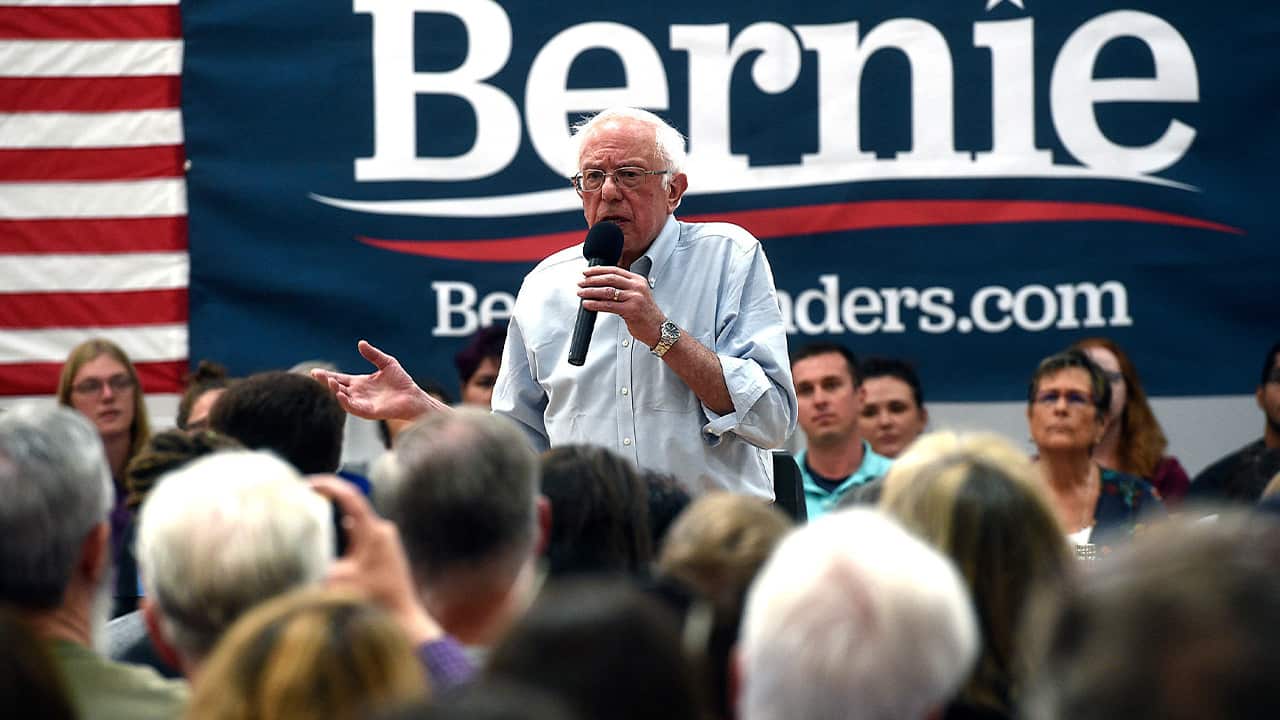 Photo of Bernie Sanders speaking at the podium