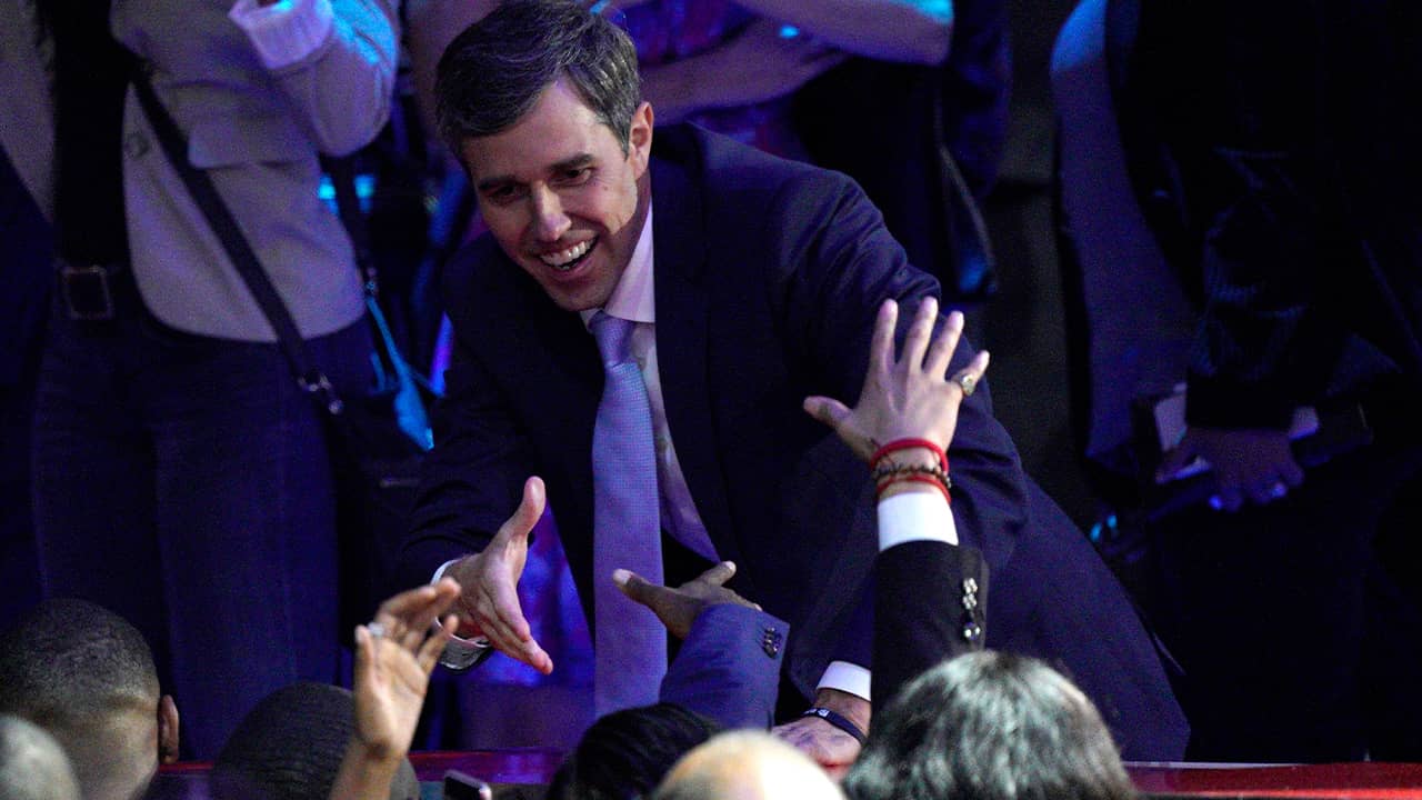 Photo of Beto O'Rourke greeting supporters