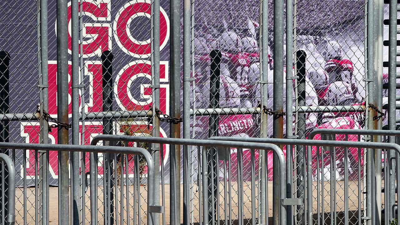 Photo of a mural showing Nebraska football players