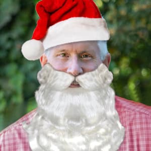 columnist mug of Bill McEwen as Santa Claus