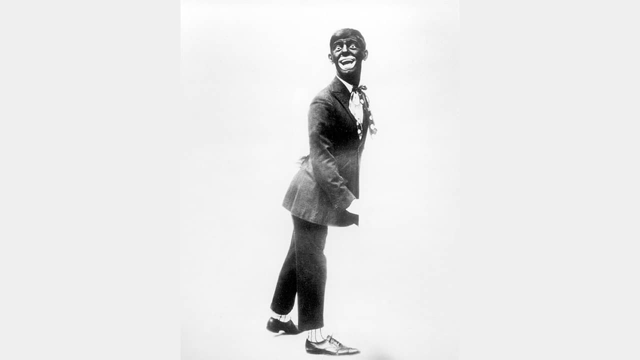 Photo of Eddie Cantor wearing blackface while performing "If You Knew Susie."