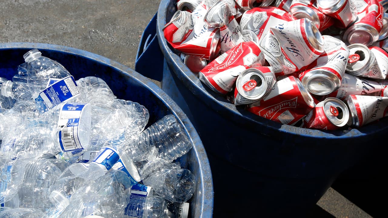 Photo of water bottles and Budweiser cans