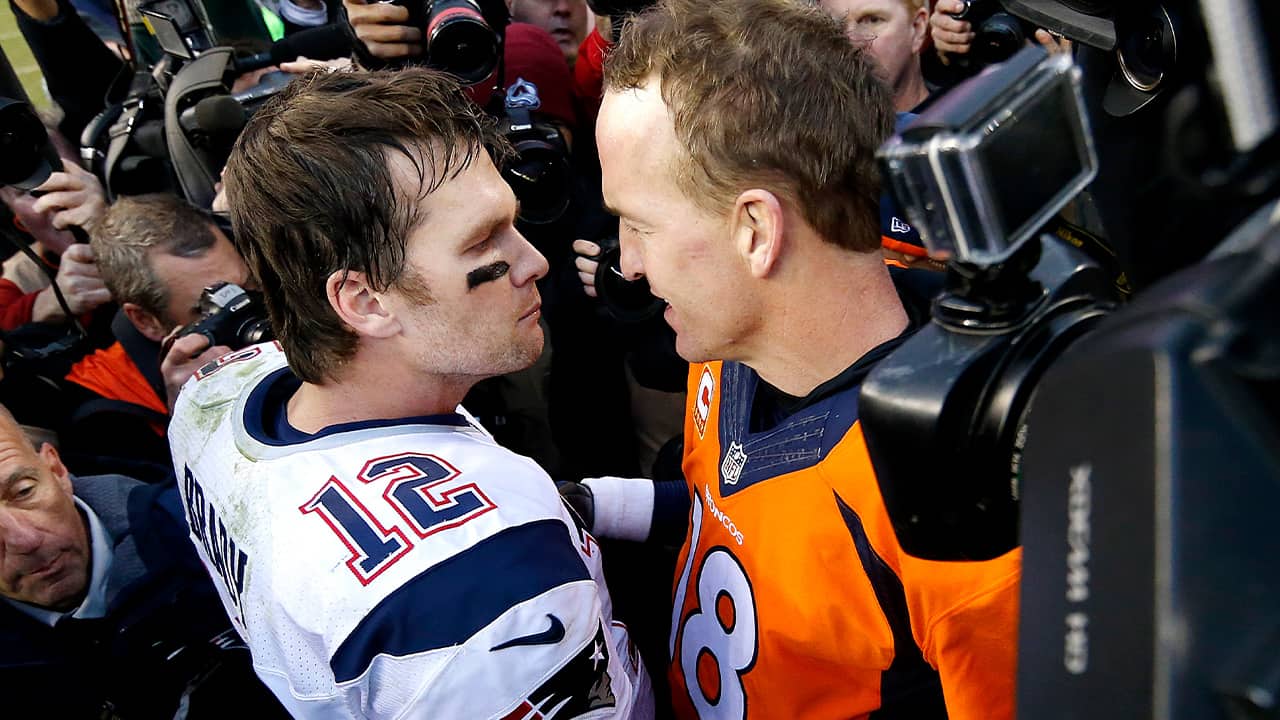 Photo of New England Patriots quarterback Tom Brady (12) and Denver Broncos quarterback Peyton Manning 