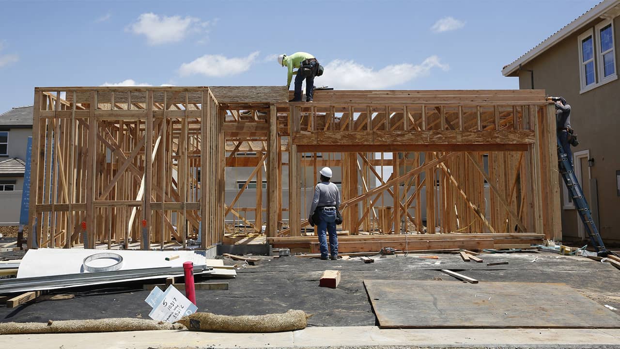 Photo of construction site and workers