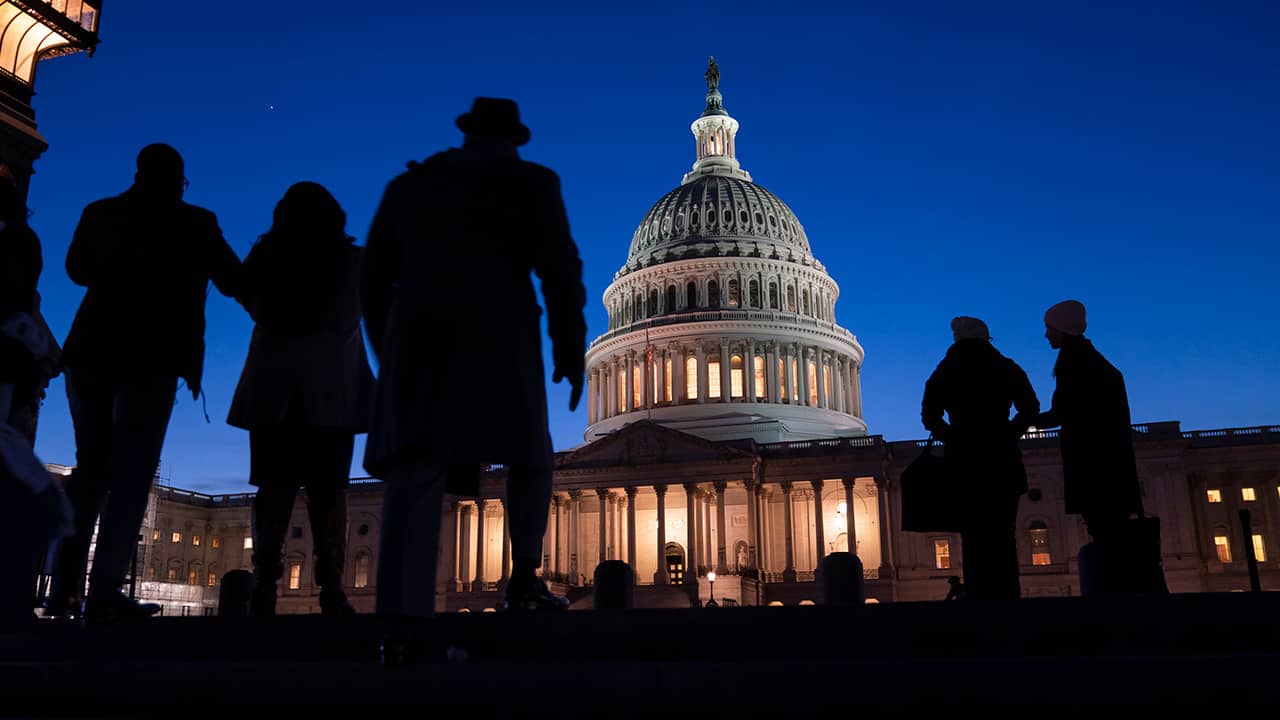 Photo of the Capitol at night