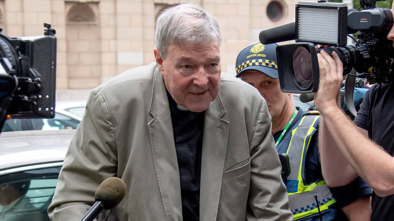 Photo of Cardinal George Pell leaving County Court in Melbourne