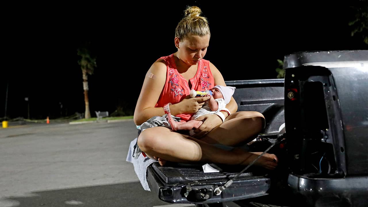 Photo of Lorrainda Smith sitting with her 2-day-old son, Luke