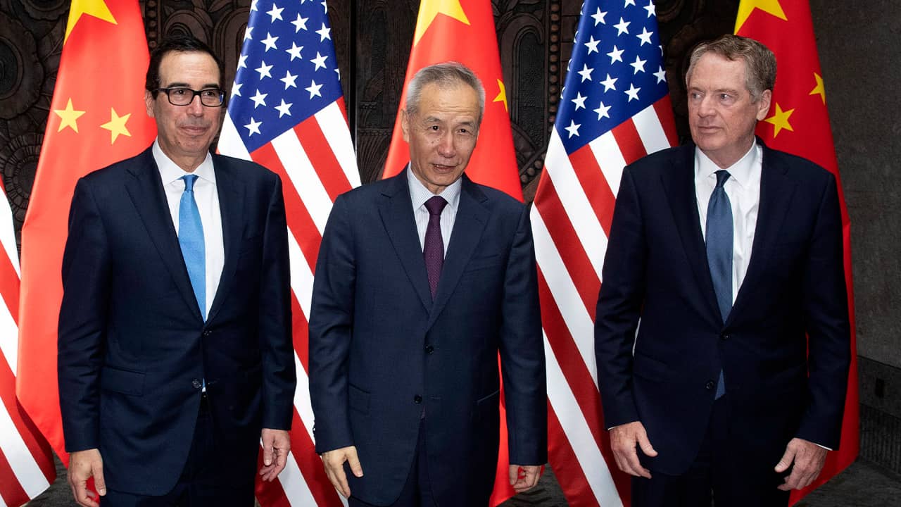 Photo of Chinese Vice Premier Liu He, center, posing with U.S. Trade Representative Robert Lighthizer, right, and Treasury Secretary Steven Mnuchin