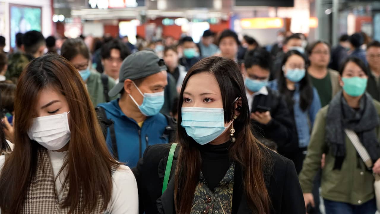 Photo of people wearing masks to prevent an outbreak of a new virus in China