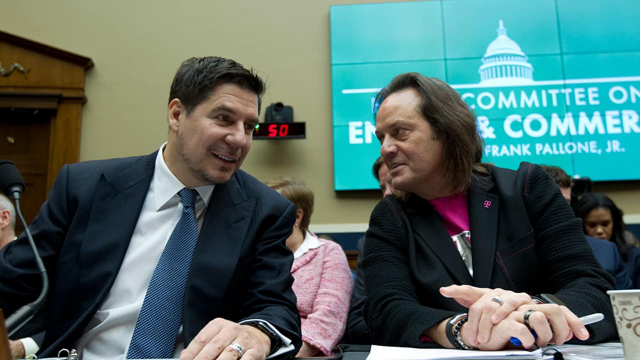 Photo of Sprint Corporation Executive Chairman Marcelo Claure and T-Mobile US CEO and President John Legere during the House Commerce subcommittee hearing on Capitol Hill