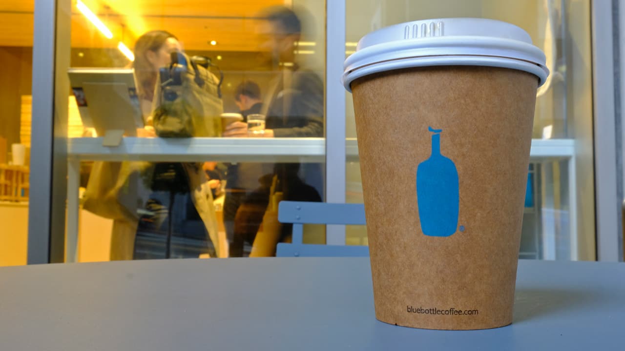 Photo of a Blue Bottle Coffee paper to-go cup