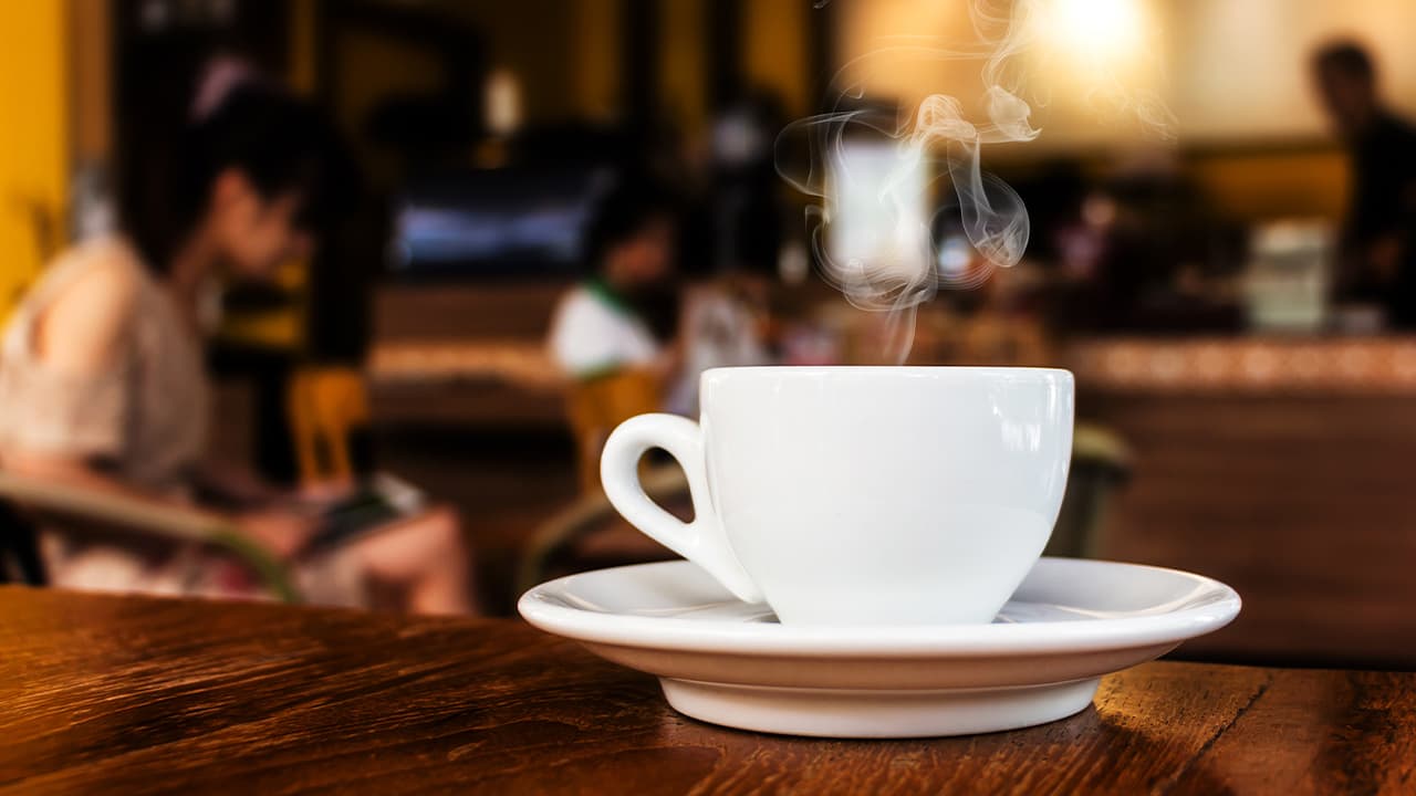 photo of a cup of coffee in a coffee shop