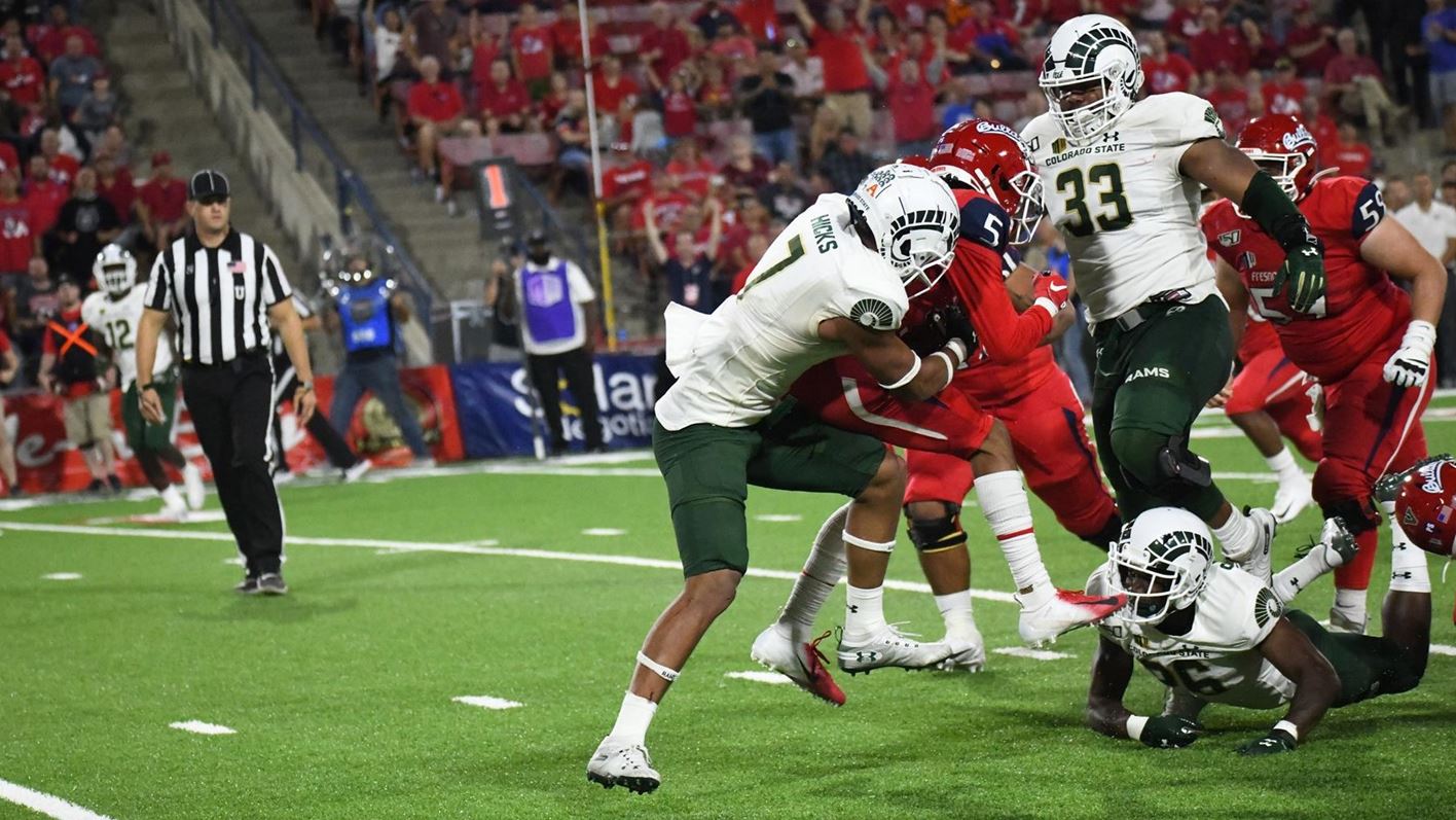 Colorado State's Jamal Hicks (7) corals Fresno State wide receiver Jalen Cropper
