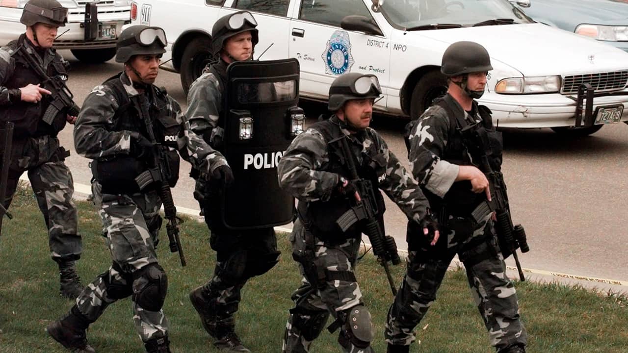 Photo of SWAT team marching into Columbine High School