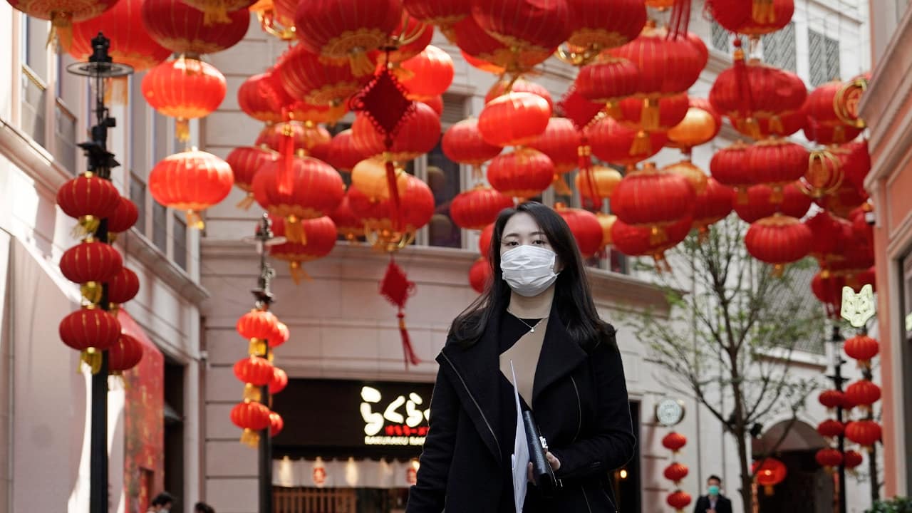 Photo of a woman wearing a mask in Hong Kong