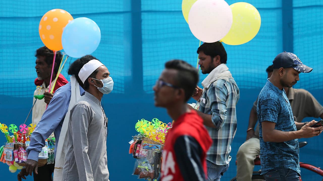 Photo of people wearing face masks in India