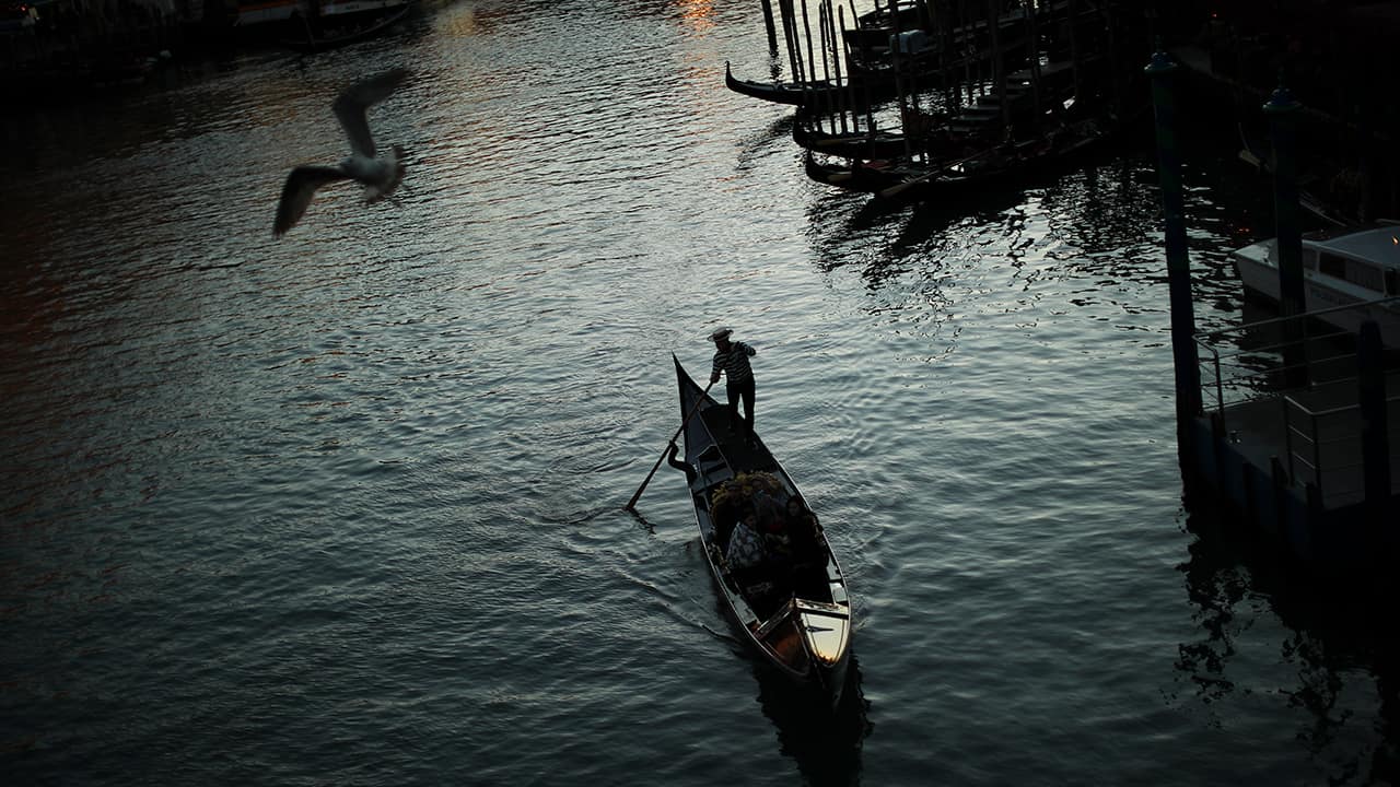 Photo of a gondolier in Venice, Italy 