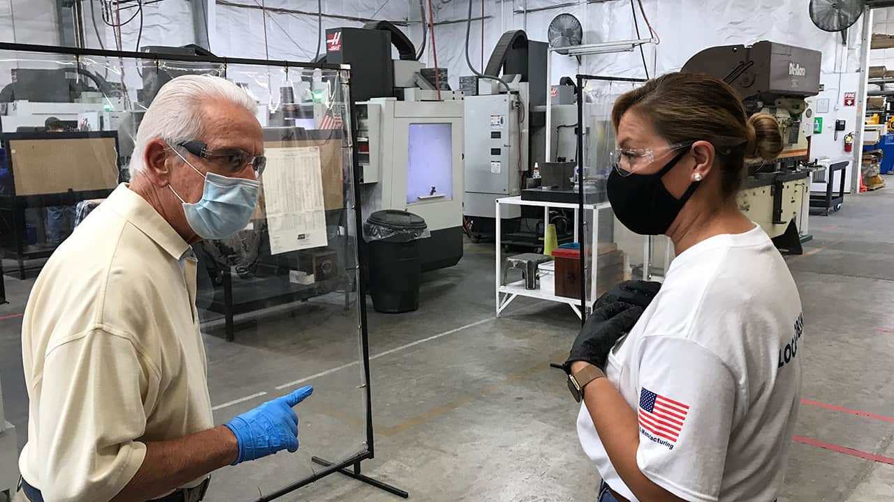 Image of Rep. Jim Costa and Total Concept Enterprises employee talking about how the company has reacted to the pandemictottotal