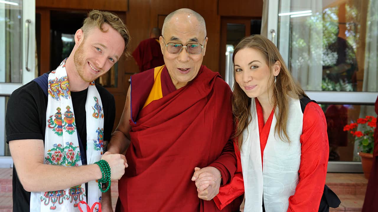 Photo of Dalai Lama, center, with Abe Kunin, left, and Junelle Kunin 