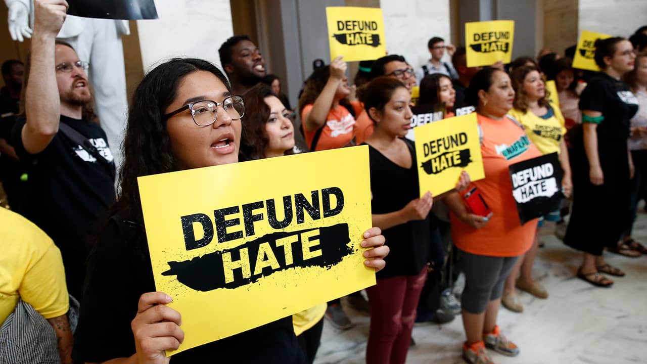 Photo of protestors gathering to defund border protection