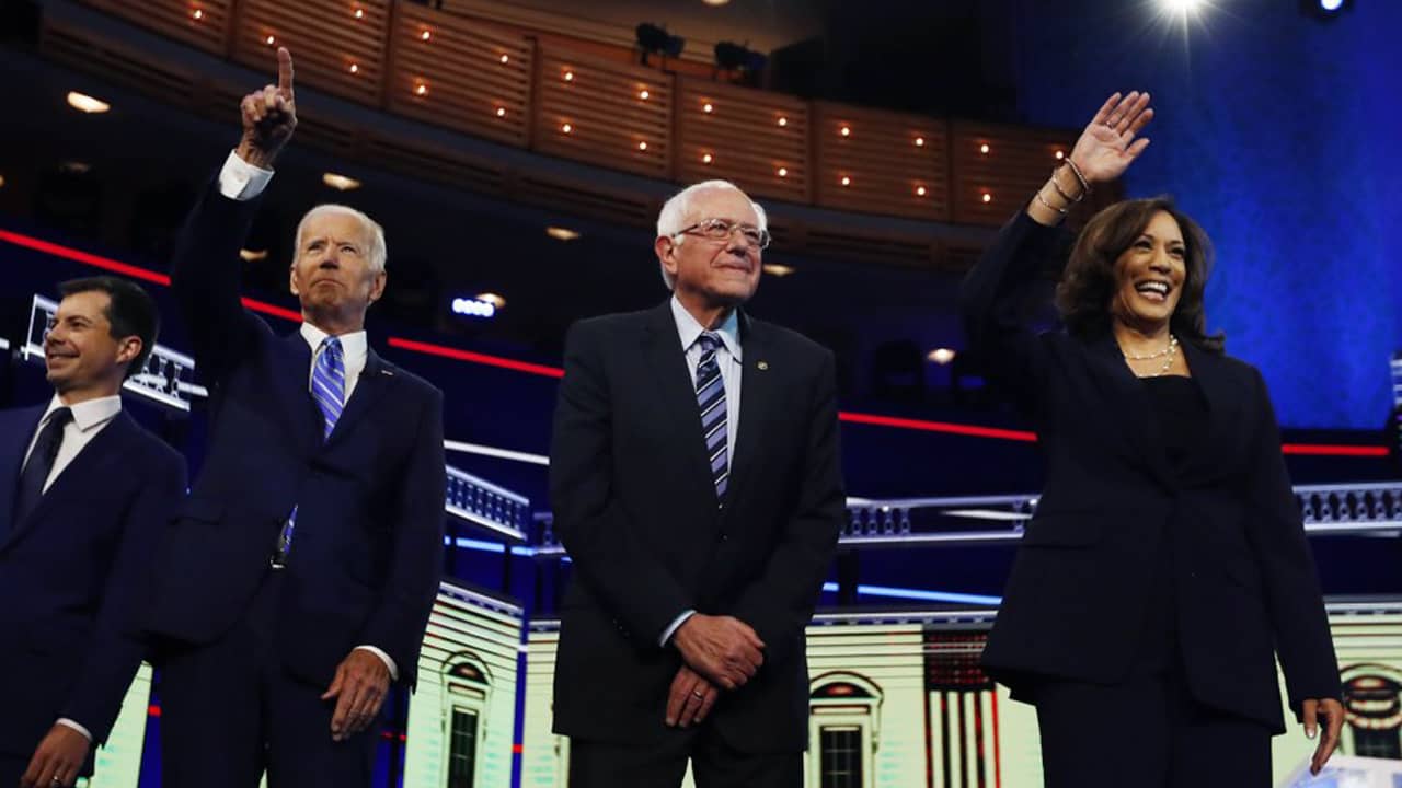 Photo of Democratic presidential candidates before the start of the Democratic primary debate