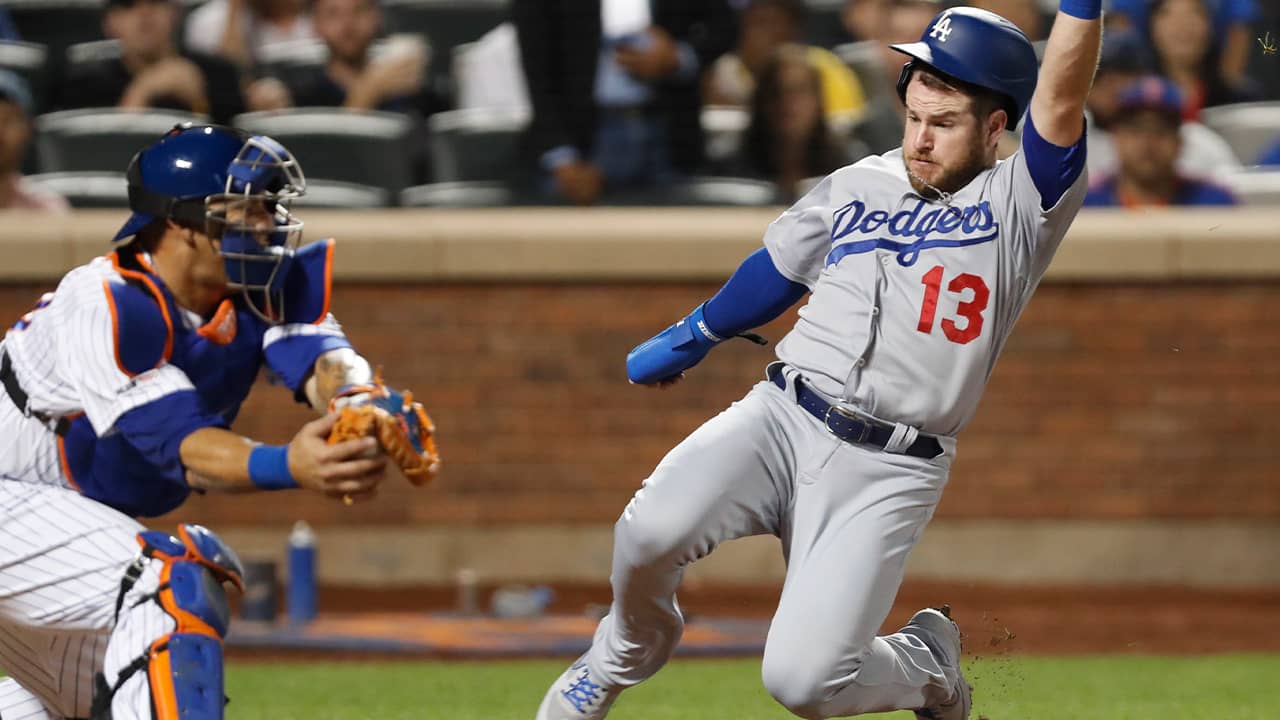 Photo of Max Muncy running home to score