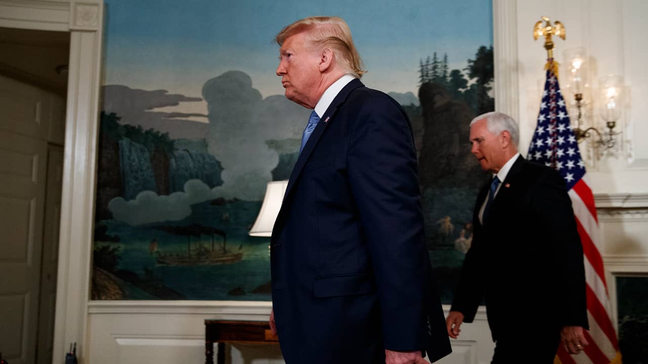 Photo of President Donald Trump and Vice President Mike Pence walking through the White House