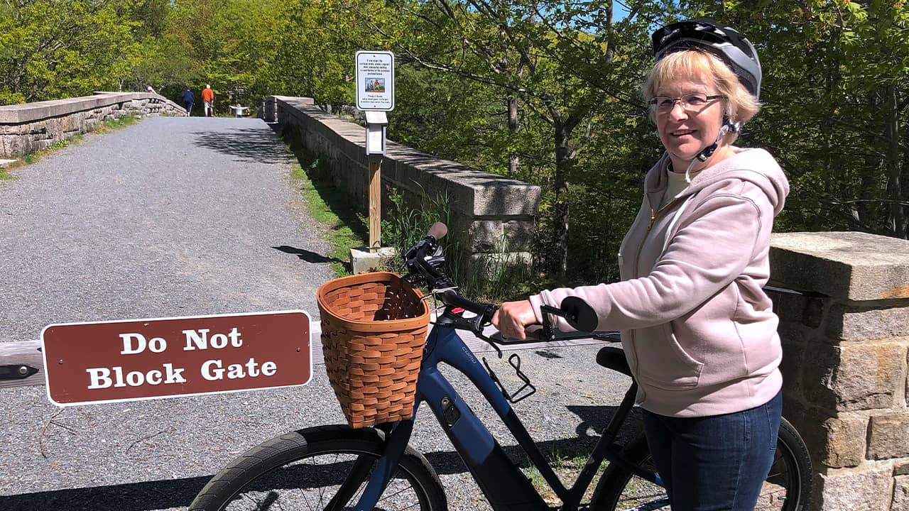 Photo of a woman with an electric bike