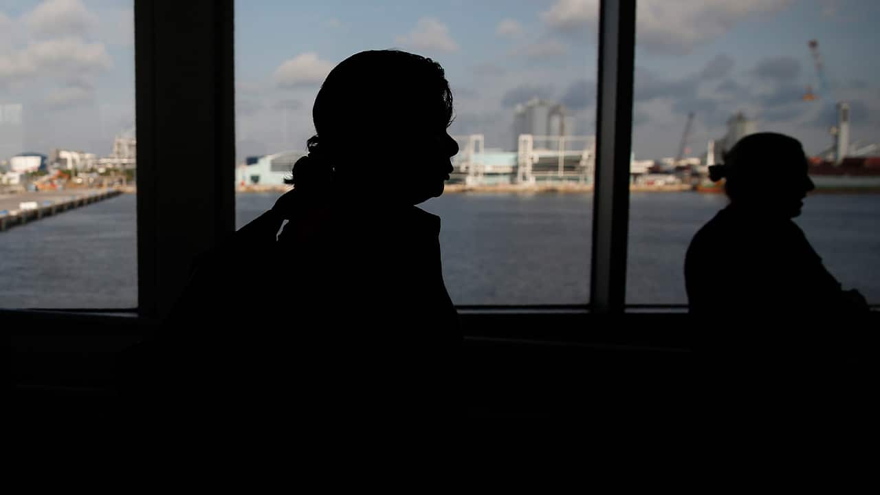 Photo of passengers boarding a ferry