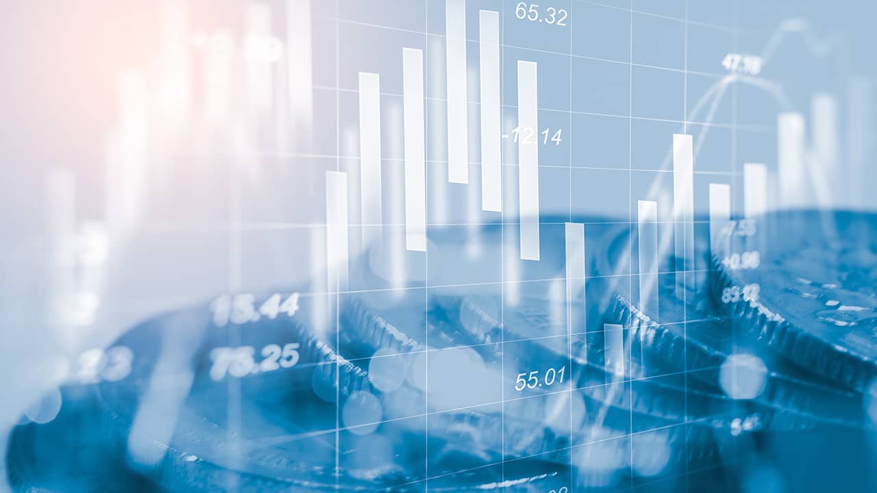 Stock photo of economy charts and coins