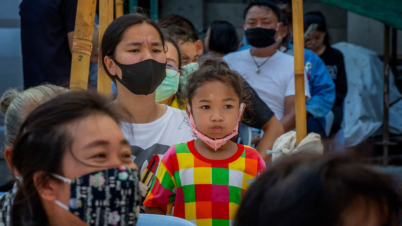 Photo of people wearing masks