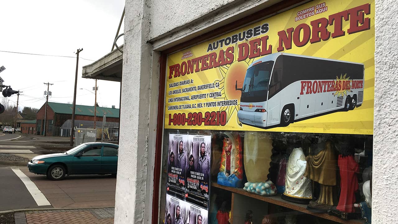 Photo of sign advertising bus trips to California with connections to Mexico