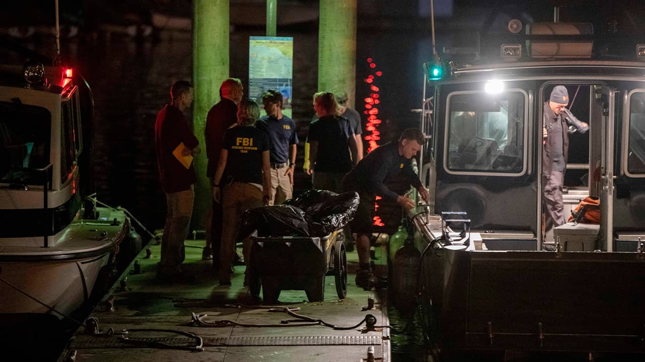 Photo of FBI carting away evidence taken from the scuba boat Conception