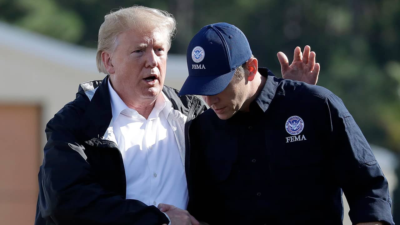 Photo of Donald Trump and Brock Long