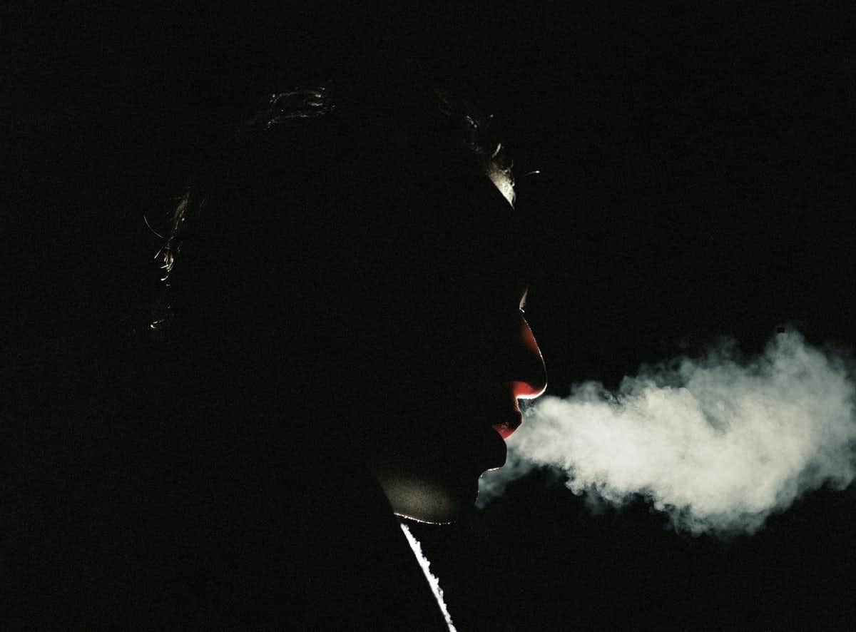 Photo of someone coughing 