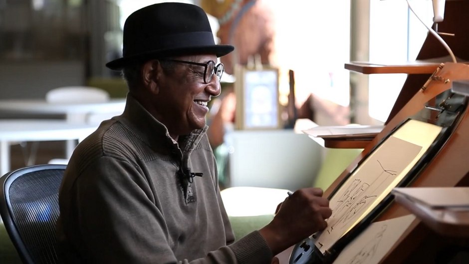 Picture of Floyd Norman sketching
