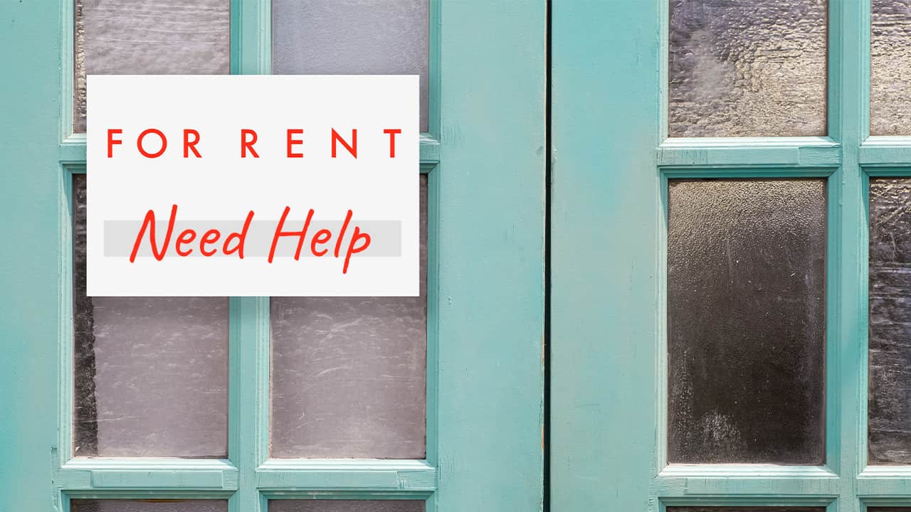 For Rent, Need Help sign on doors of a building