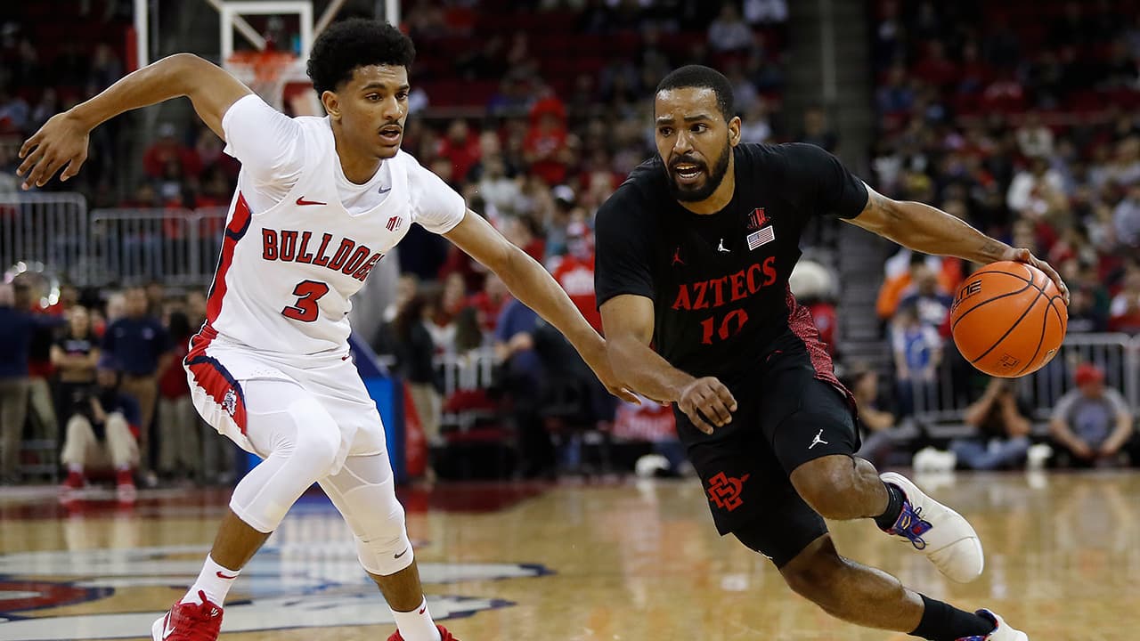 Photo of Fresno State's Jarred Hyder and San Diego State's KJ Feagin in game action