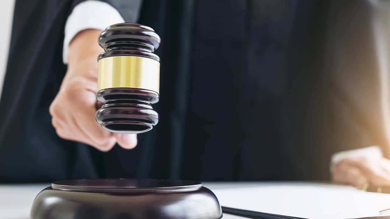 Photo of a judge banging a gavel