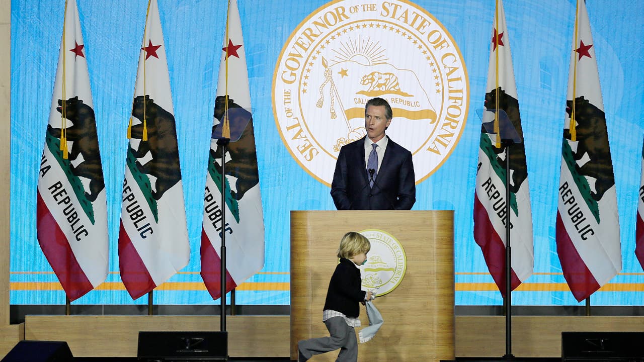 Photo of Gov. Gavin Newsom speaking during his inauguration 