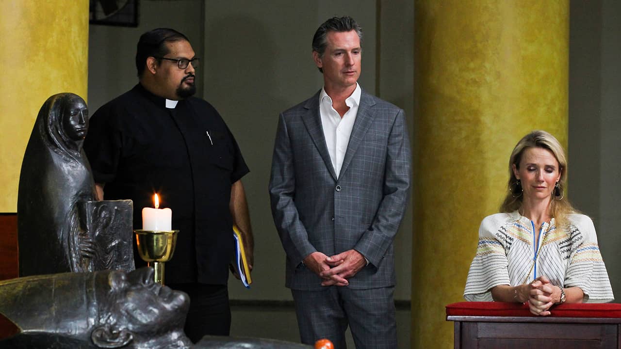 Photo of Gavin Newsom, Jennifer Siebel Newsom and Father Francisco Villalobos