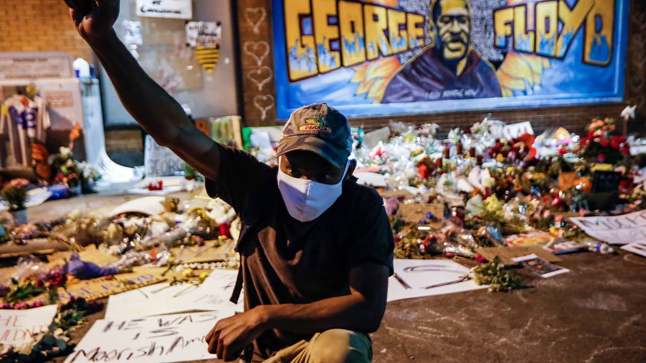 Photo of a protestor at the George Floyd memorial