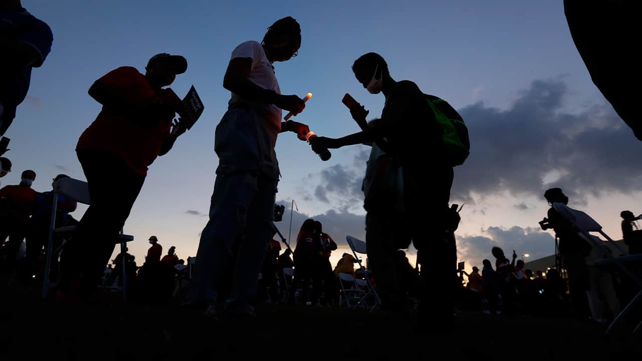 Photo of a candle light vigil to honor George Floyd 