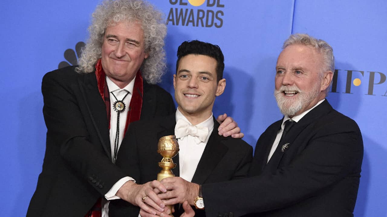 Photo of Roger Taylor, Rami Malek, and Brian May