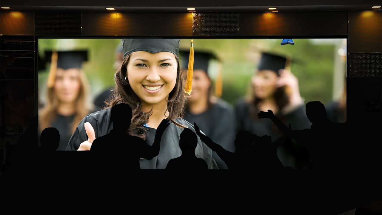 Image conveying virtual high school graduation being shown on local television
