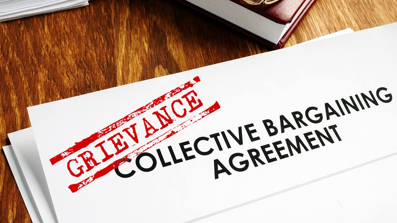 Photo illustration of a grievance document