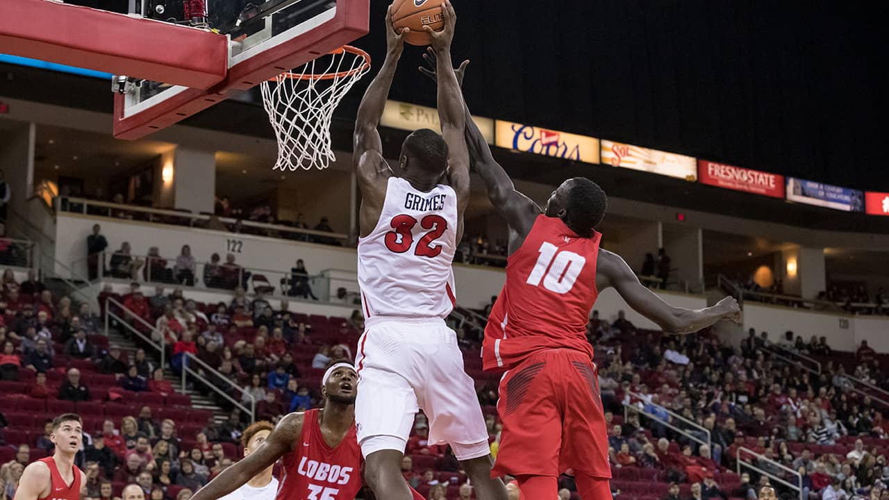 Photo of Fresno State's Nate Grimes going for a dunk