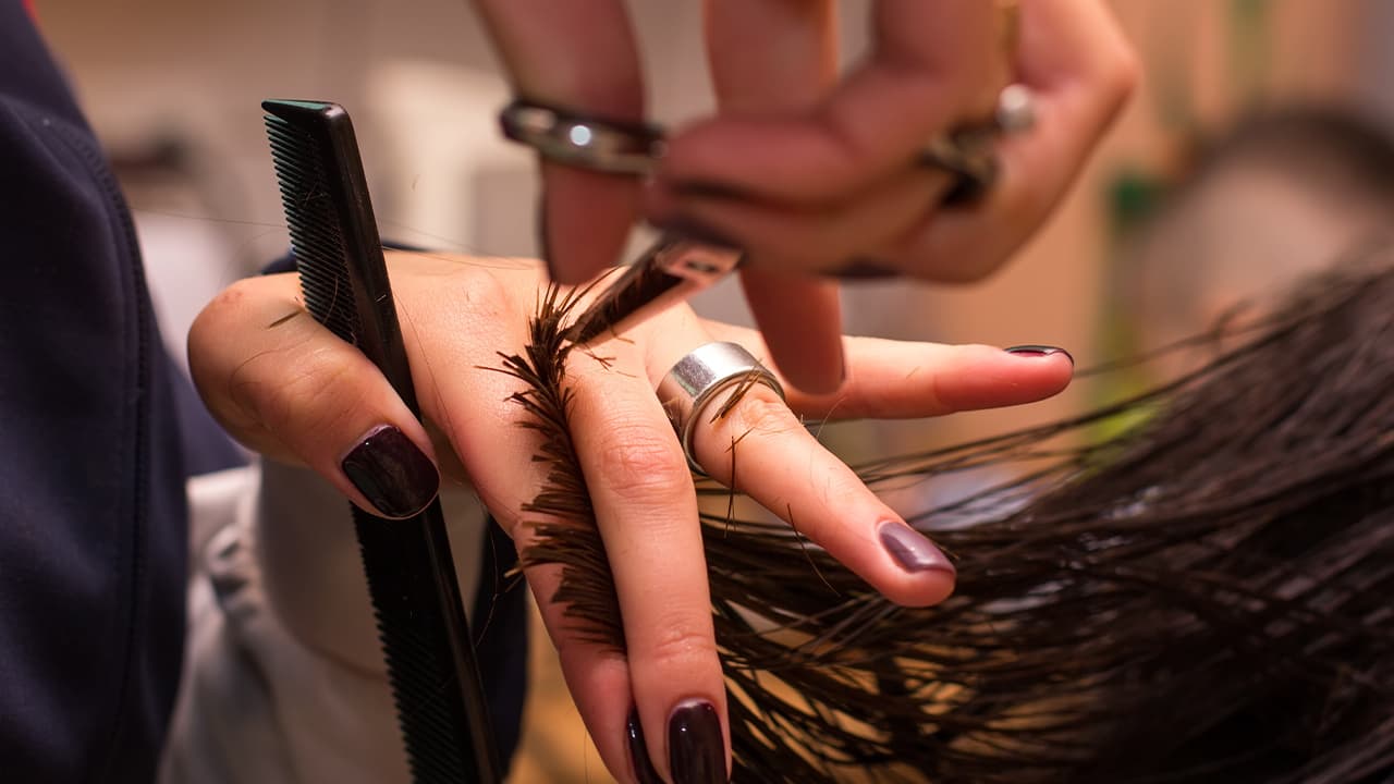 Photo of someone getting a haircut