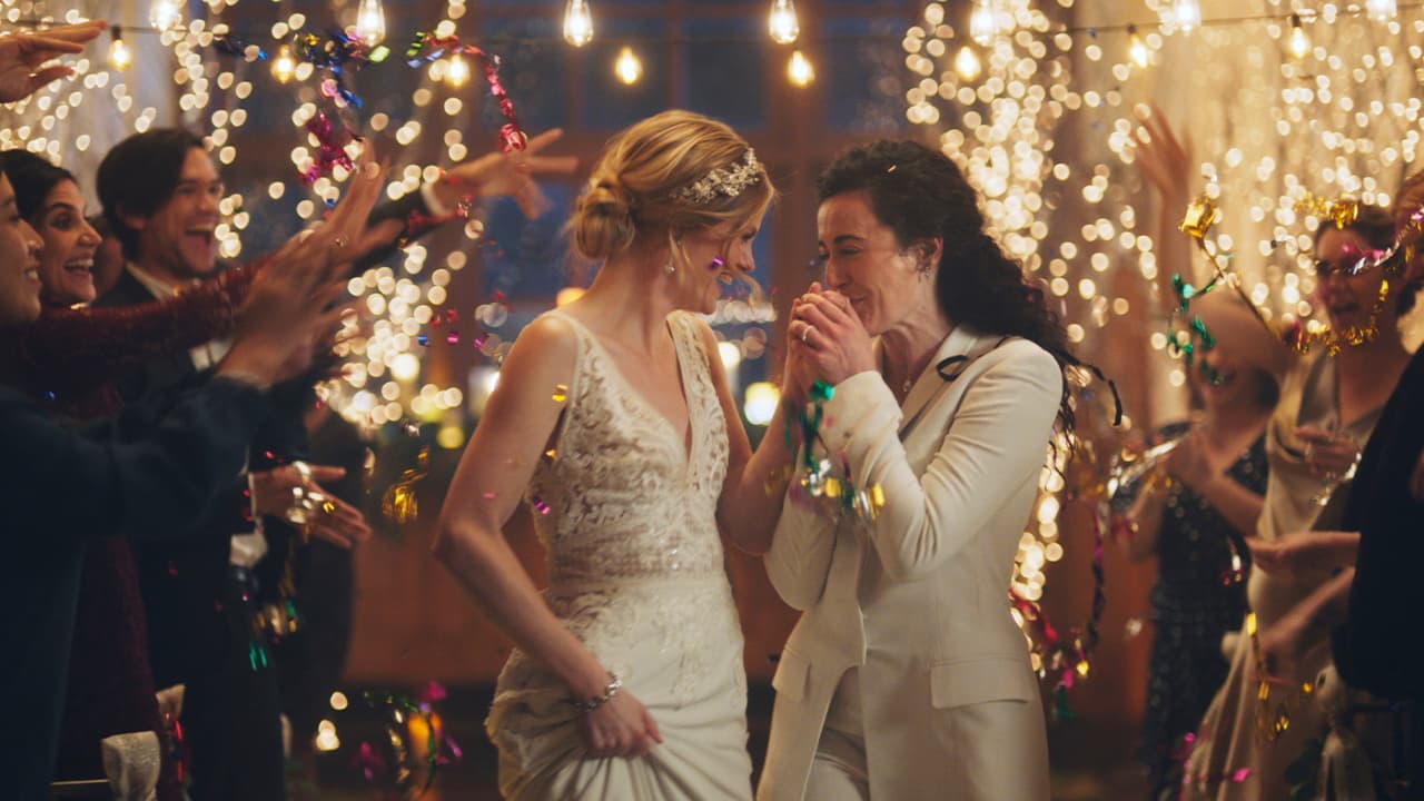 Photo of a scene of Zola's advertisement featuring two brides